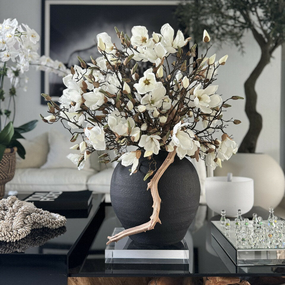black konos vase with white magnolias