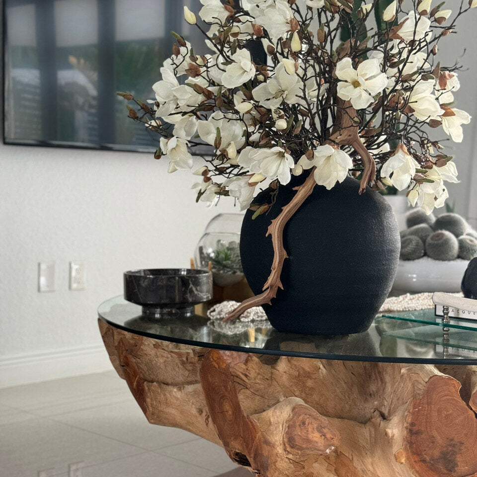 black konos vase with white magnolias