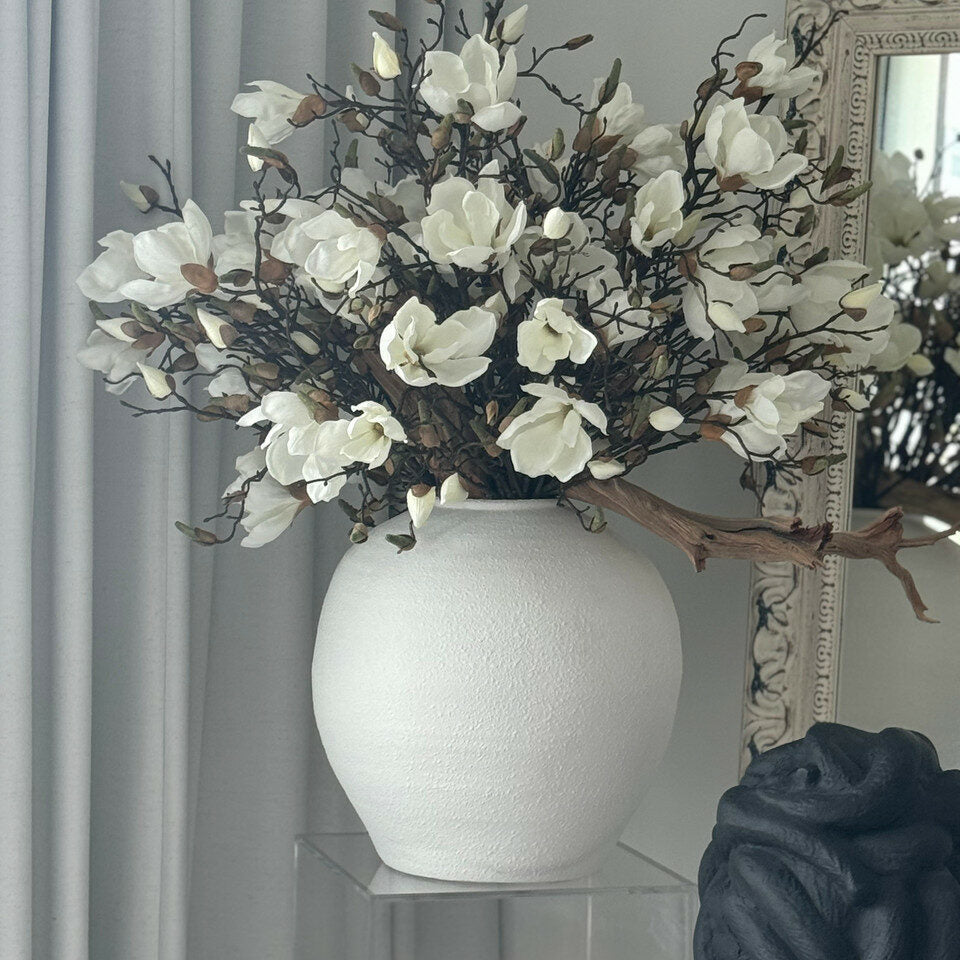 konos vase with white magnolias