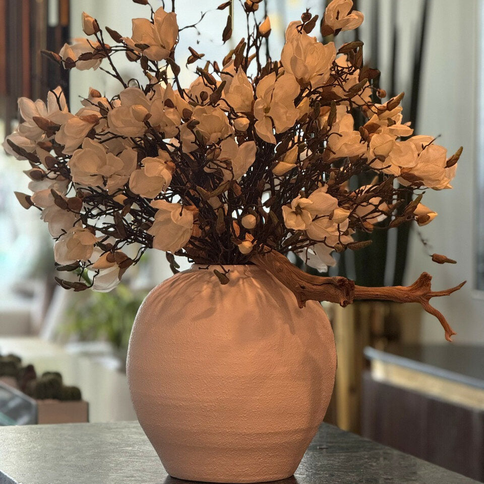 konos vase with white magnolias