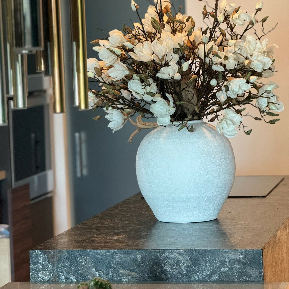 konos vase with white magnolias